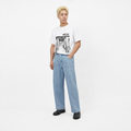 A male model is wearing a T-shirt paired with the Smith's 1906 MJN02 Light Blue Jeans.