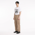 A male model is wearing a T-shirt paired with the Smith's 1906 MPT02 Khaki Pants.