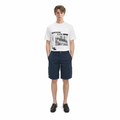 A male model is wearing a shirt paired with the Smith's 1906 MSO02 Navy Shorts.
