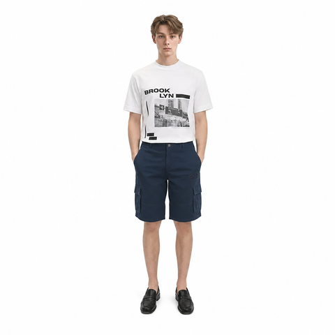 A male model is wearing a shirt paired with the Smith's 1906 MSO02 Navy Shorts.