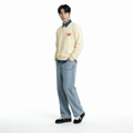 A male model is wearing jeans paired with the Smith's 1906 MSW02 Beige Sweatshirt.
