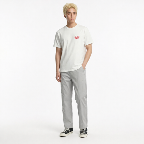 A male model is wearing a pair of pants paired with the Smith's 1906 MTE01 White T-Shirt.
