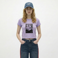 A female model is wearing a T-shirt paired with the Smith's 1906 UCP04 Blue Cap.