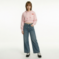 A female model is wearing a pair of jeans paired with the Smith's 1906 WHO01 Pink Hoodie.