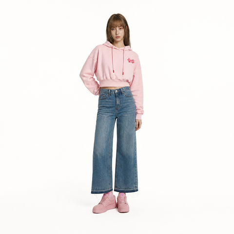 A female model is wearing a hoodie paired with the Smith's 1906 WJN01 Light Blue Jeans.