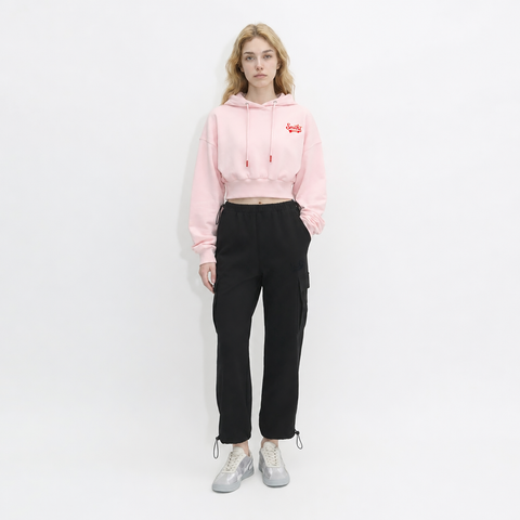 A female model is wearing a hoodie paired with the Smith's 1906 WPT01 Black Pants.