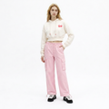 A female model is wearing a hoodie paired with the Smith's 1906 WPT01 Pink Pants.