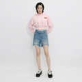 A female model is wearing a hoodie paired with the Smith's 1906 WSO02 Light Blue Denim Shorts.